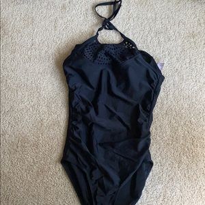 Black one piece bathing suit. Worn 4 times